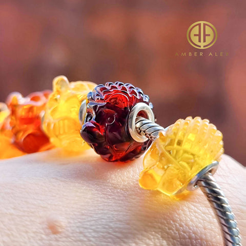 Multi-Color Amber Carved Hedgehog Charm Bead