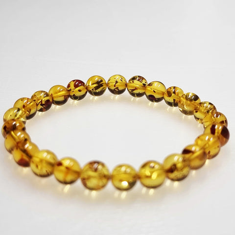 Cognac with Dark Flakes Amber Round Beads Stretch Bracelet