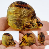 Fossil Amber Carved Hedgehog Figurine