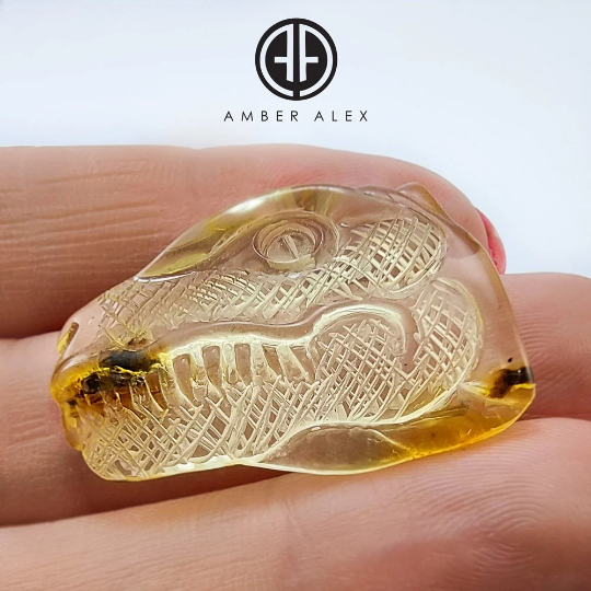 Natural Amber Carved Dinosaur Cabochon with Insect