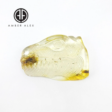 Natural Amber Carved Dinosaur Cabochon with Insect