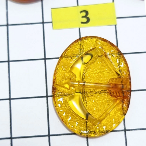 Cognac Amber Carved Sagittarius Cabochons