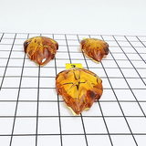 Cognac Amber Carved Puffed Leaf Stone