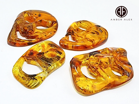 Cognac Amber Carved Faces Cabochons