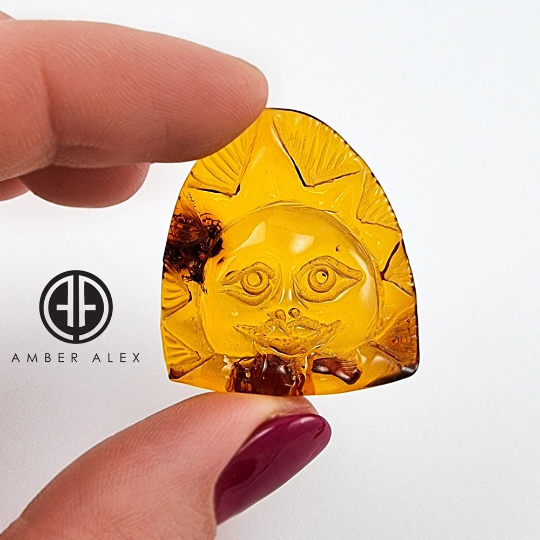 Cognac Amber Carved Sun And Moon Cabochon