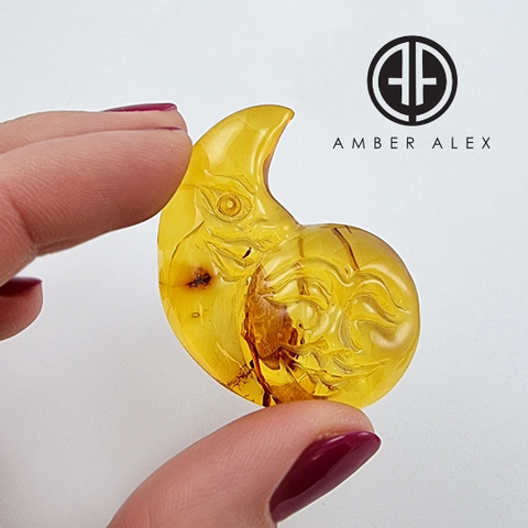 Cognac Amber Carved Sun Cabochon