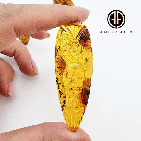 Cognac Amber Carved Owl with Skull  Cabochons