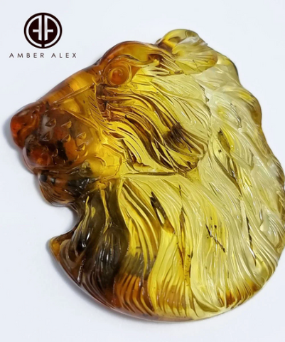 Fossil Amber Carved Lion Cabochon