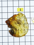 Fossil Amber Carved Lion Cabochon