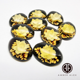 Cherry Amber Engraved Flower Oval Shape Cabochon