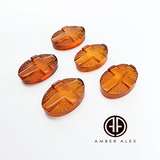 Cognac Amber Carved Cross Cabochon